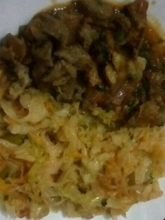 A picture of Beef stew and Stir fried cabbages.