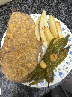 Una foto de 634. Pimientos de padrón caramelizados al ajillo (guarnición)
