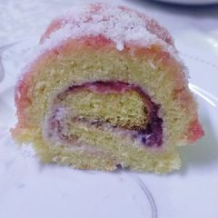 Strawberry and cream swiss roll A picture of Strawberry and cream swiss roll.