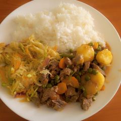 White rice with beaf stew & steamed cabbage A picture of White rice with beaf stew & steamed cabbage.