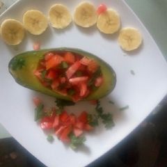 Tomato_stuffed avocado A picture of Tomato_stuffed avocado.