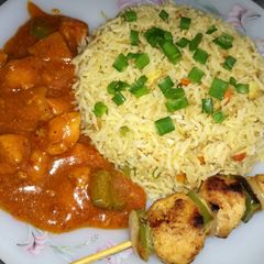 Chicken Shashlik with Egg Fried rice & Shashlik stick A picture of Chicken Shashlik with Egg Fried rice & Shashlik stick.