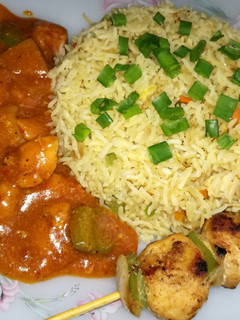 A picture of Chicken Shashlik with Egg Fried rice & Shashlik stick.