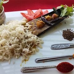 A picture of Anguri dal tadka with Jeera rice.