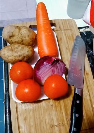 A picture of 🍅 🥕 🥔 🐟 abc soup.