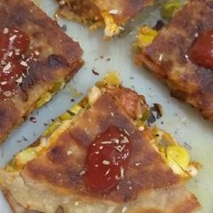 Pizza paratha A picture of Pizza paratha.