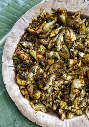 A picture of পুঠি মাছ চুঙাত দিয়া /Swam barb fish cooked in Bamboo tubes.