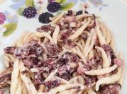 Una foto di trofie e pancetta
