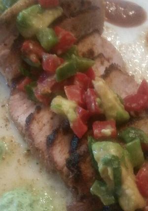 A picture of Strawberry-Chipotle Pork Chops w/ Avocado Crema & Salsa.