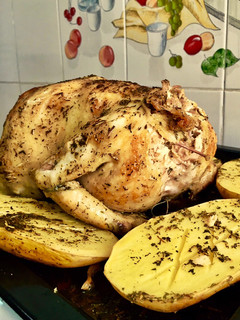 Una foto de Pollo asado con patatas
