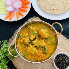 A picture of Pepper Chicken Kurma.