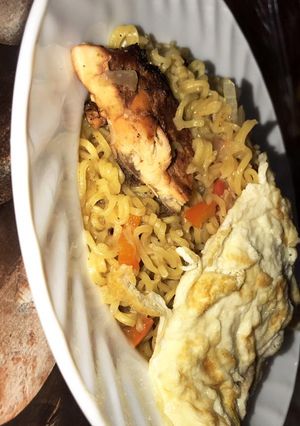 A picture of Noodles and egg with yahuza suya.