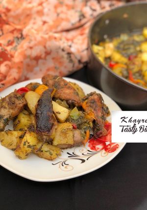 A picture of Garlic and herbs roasted potatoes and chicken.