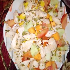 Chicken salad with veggies and sprouts A picture of Chicken salad with veggies and sprouts.