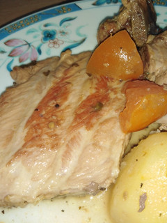 Una foto de Costilla con tomate