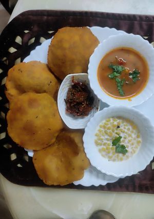 A picture of मूंगदाल पूरी और आलू की सब्जी.