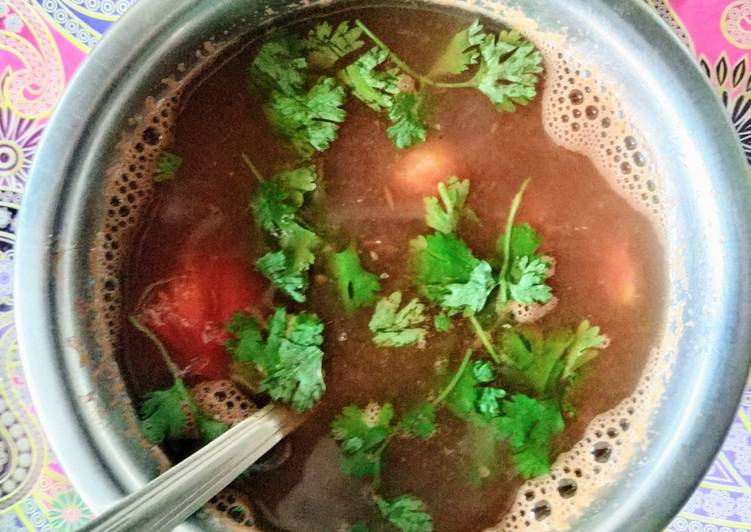 Basil leaves and tomato soup