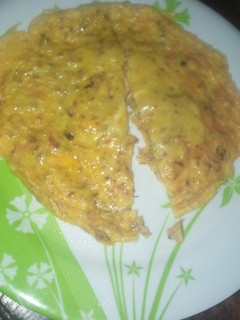 A picture of Fried egg with meat floss.