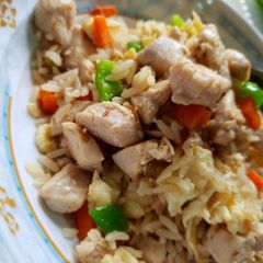 A picture of Stir fry rice and chicken.