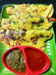 A picture of Besan chilla with vegetables.