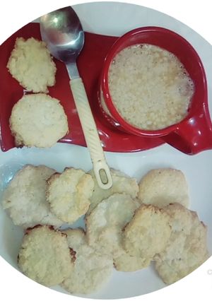 A picture of Coconut cookies with coffee.