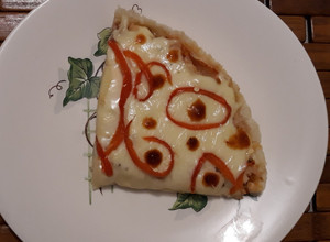 Una foto de Pizza de sierra ahumada