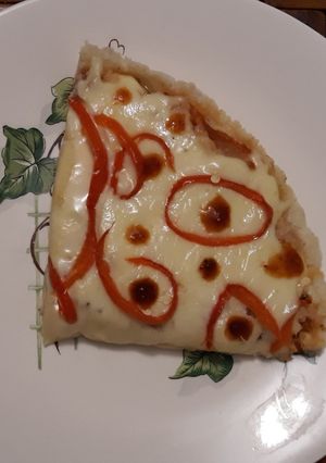 Una foto de Pizza de sierra ahumada