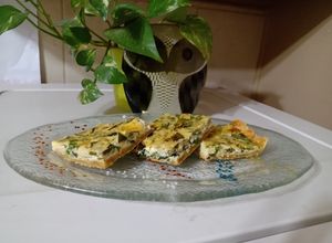 Una foto de Tarta de zapallitos y rúcula