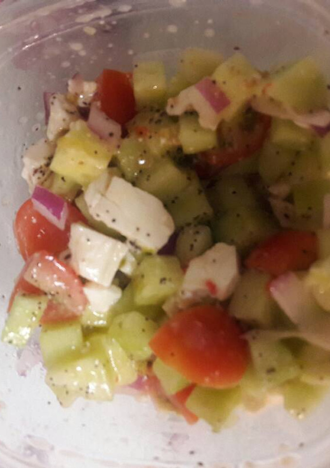 A picture of Cucumber tomato feta salad.