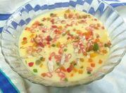 A picture of mixed fruits with milk