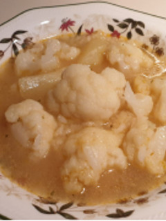 Una foto de Coliflor con patatas y arroz