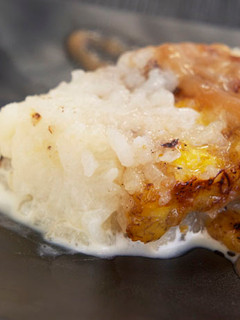 Una foto de Pastel de arroz y plátanos