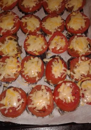 Una foto de Tomates a la parmesana