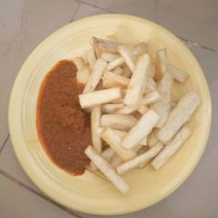 A picture of Sweet fried yam and stew.
