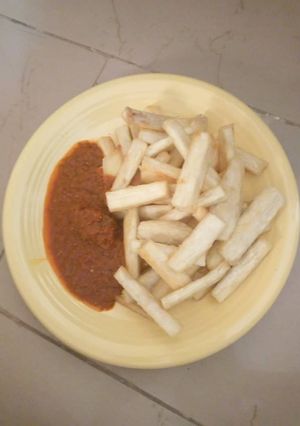 A picture of Sweet fried yam and stew.