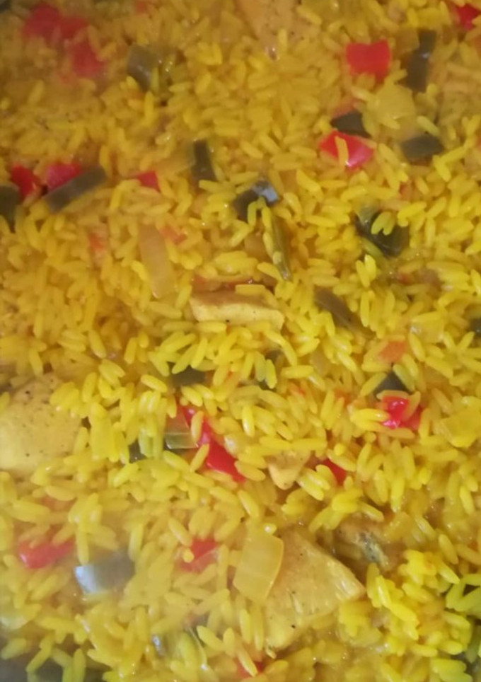 Una foto de Arroz con pollo 🥘🍗
