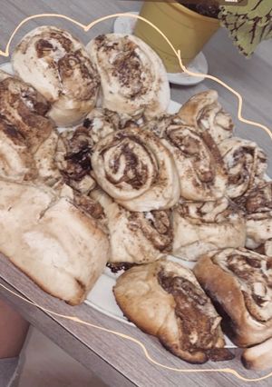 Una foto de Rolls de manzana y canela