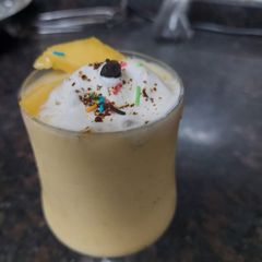A picture of Mango Shake with ice cream.
