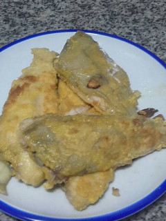 Una foto de Gallos rebozados al ajillo