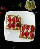 Cheesy guacamole strawberry open sandwich