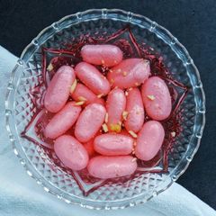 A picture of Pink Rasgulla / Paneer Jamun / Pink Jamun.