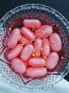 A picture of Pink Rasgulla / Paneer Jamun / Pink Jamun.