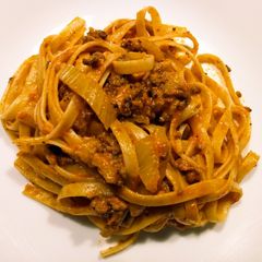A picture of Fettuccine with beef and fennel rose sauce.
