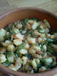 Una foto de Patatas con pimientos