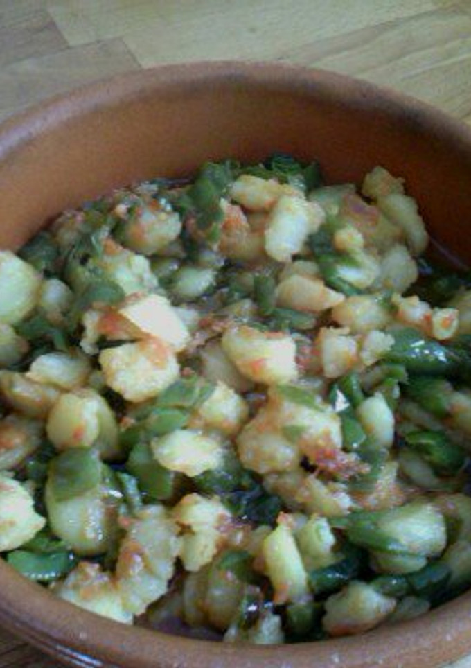 Una foto de Patatas con pimientos