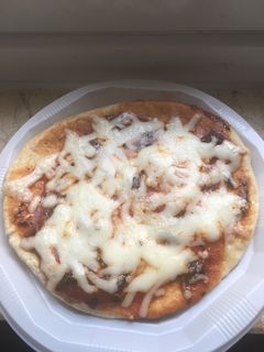 صورة لوصفة بيتزا مع إكماج خبز