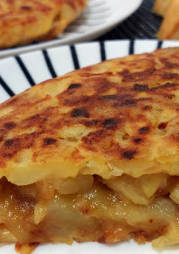 Una foto de Tortilla de patatas (con cebolla, por favor...)