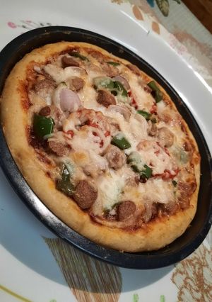 A picture of Chicken Franks pizza 🍮🍕🍕🍕.