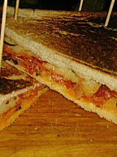 A picture of Tex's Pizza Toastie 🐷🧀 🍞🌿🍕.
