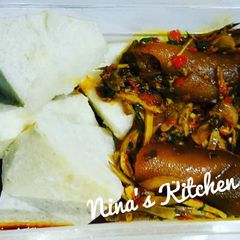 A picture of Yam with ugba sauce and pomo.